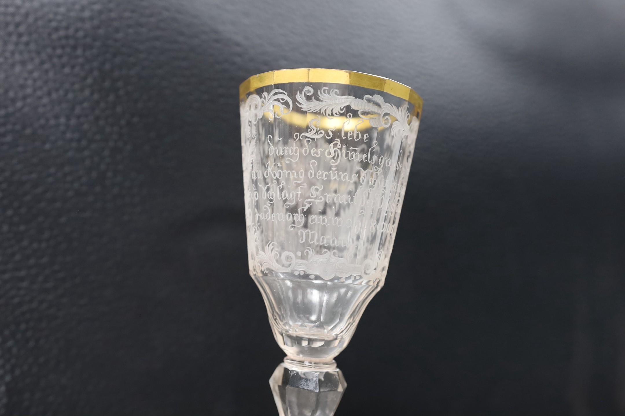 A mid 18th century German/Bohemian glass with military engraving, 17cms high